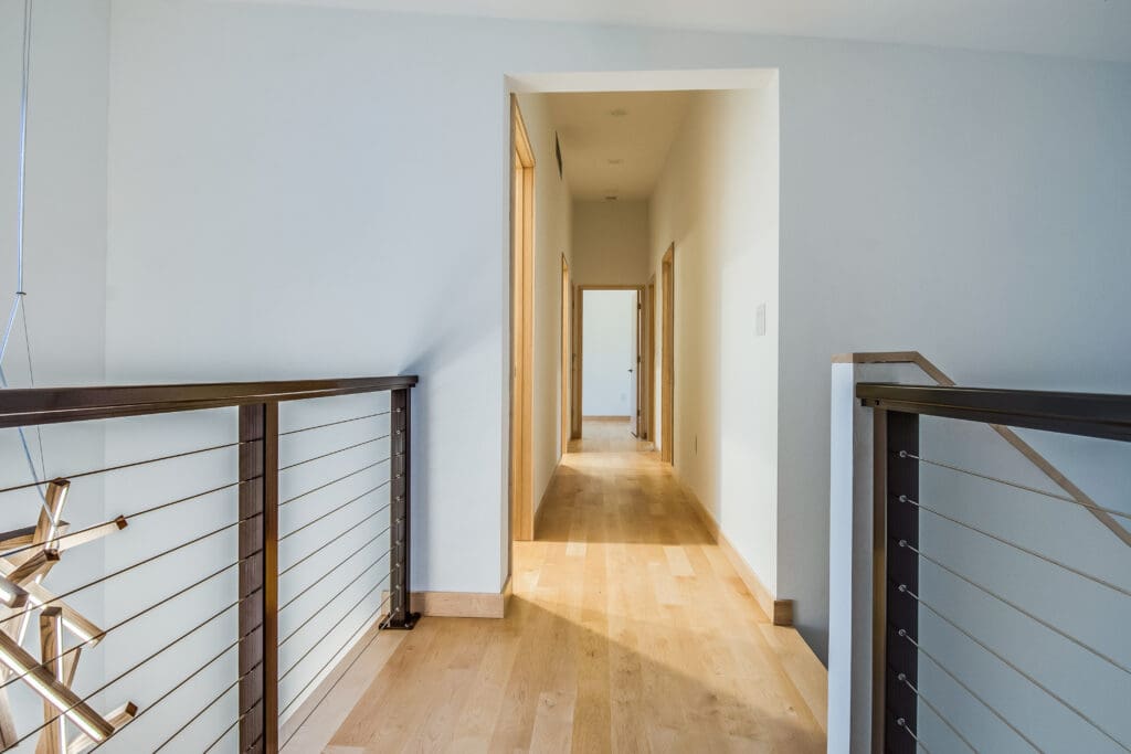 the hallway of a beautiful modern farmhouse in Mobile, Alabama